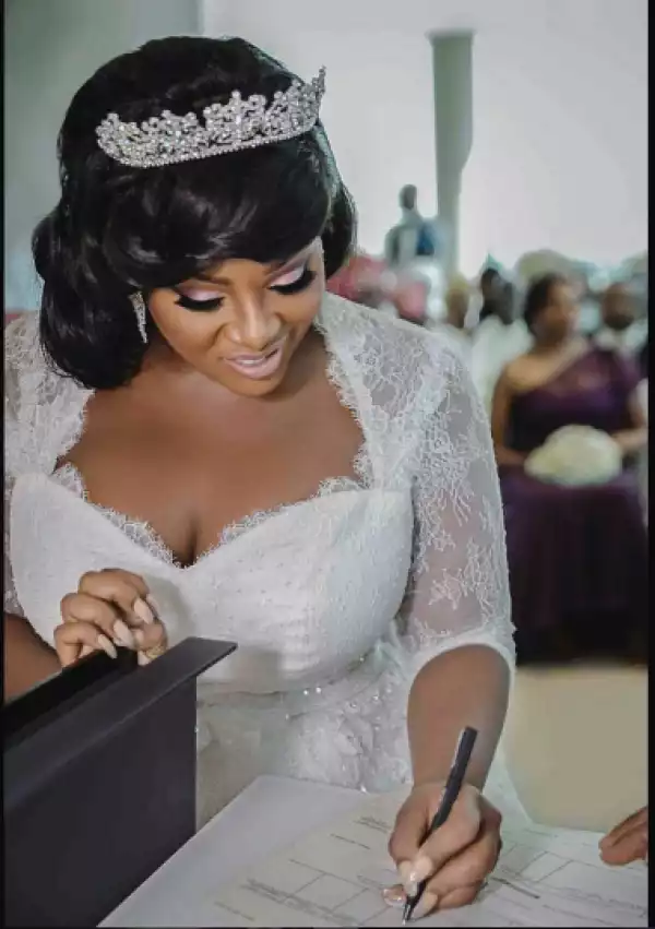 Checkout this adorable photo of Toolz signing her marriage certificate